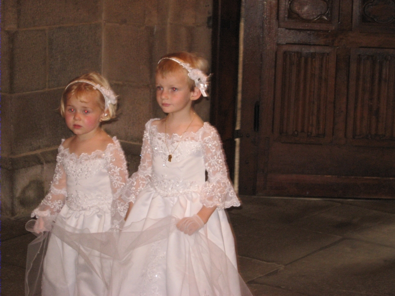 Little bridesmaids enter the Church