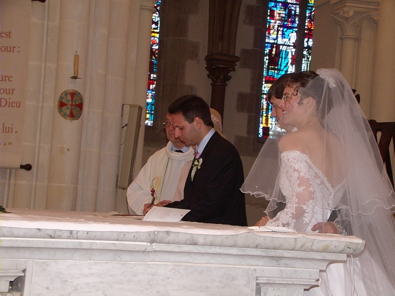 Best man signs Church wedding papers