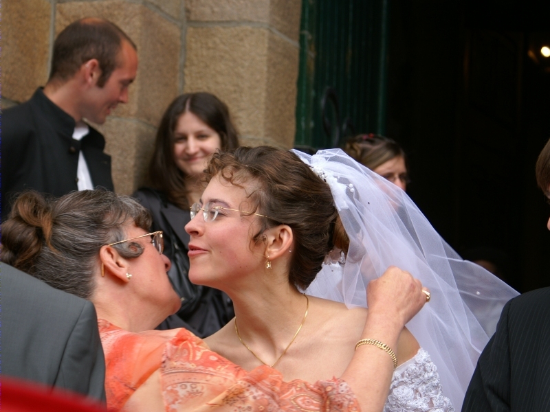 Karine's mom congratulates the wedding couple