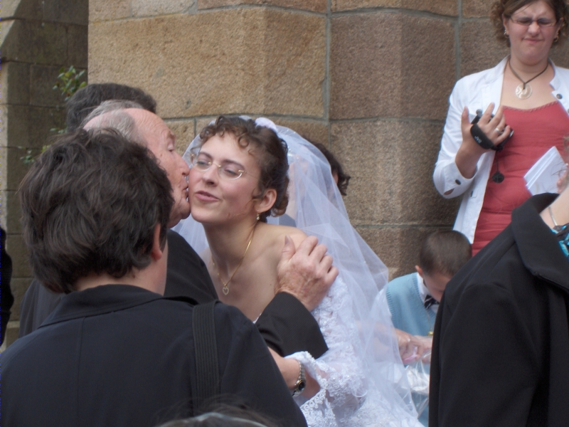 Guests congratulate the wedding couple