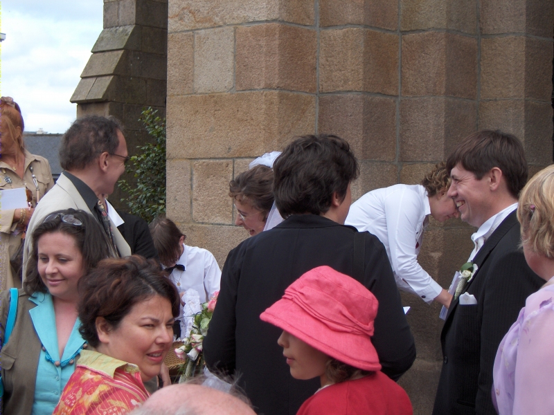 Guests congratulate the wedding couple