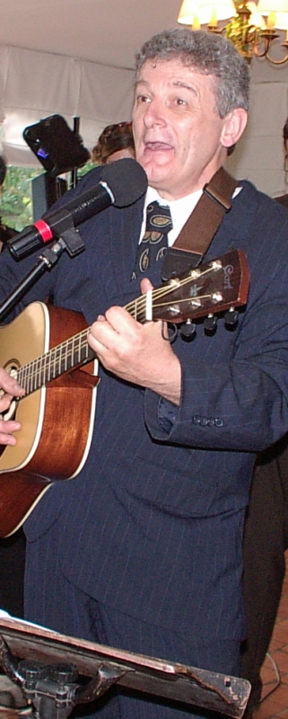 Gilles Machard playing the guitar