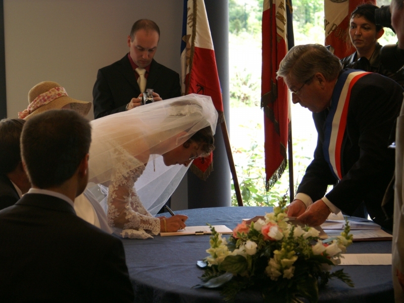 Karine signs official wedding papers