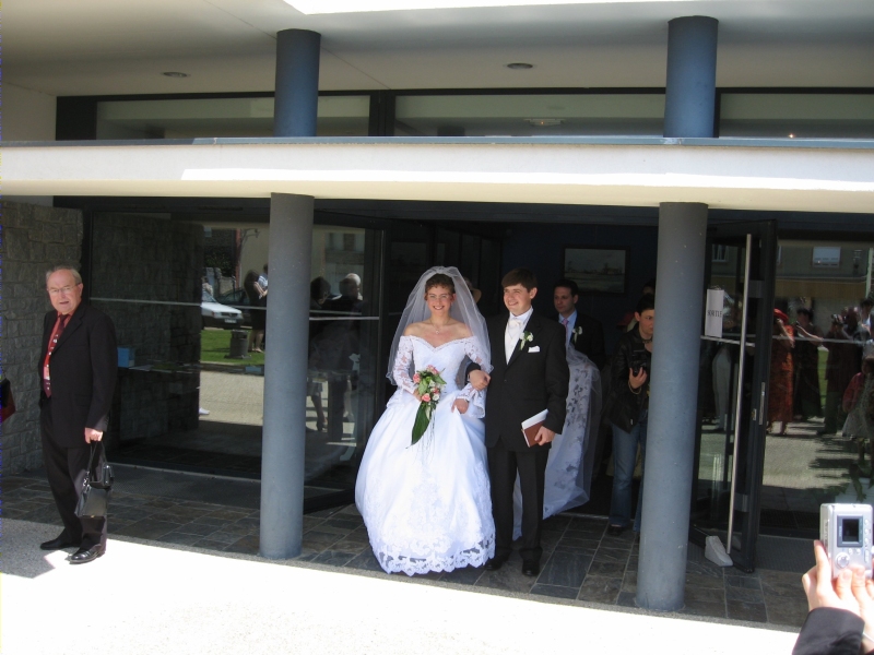 Wedding couple exits the City hall
